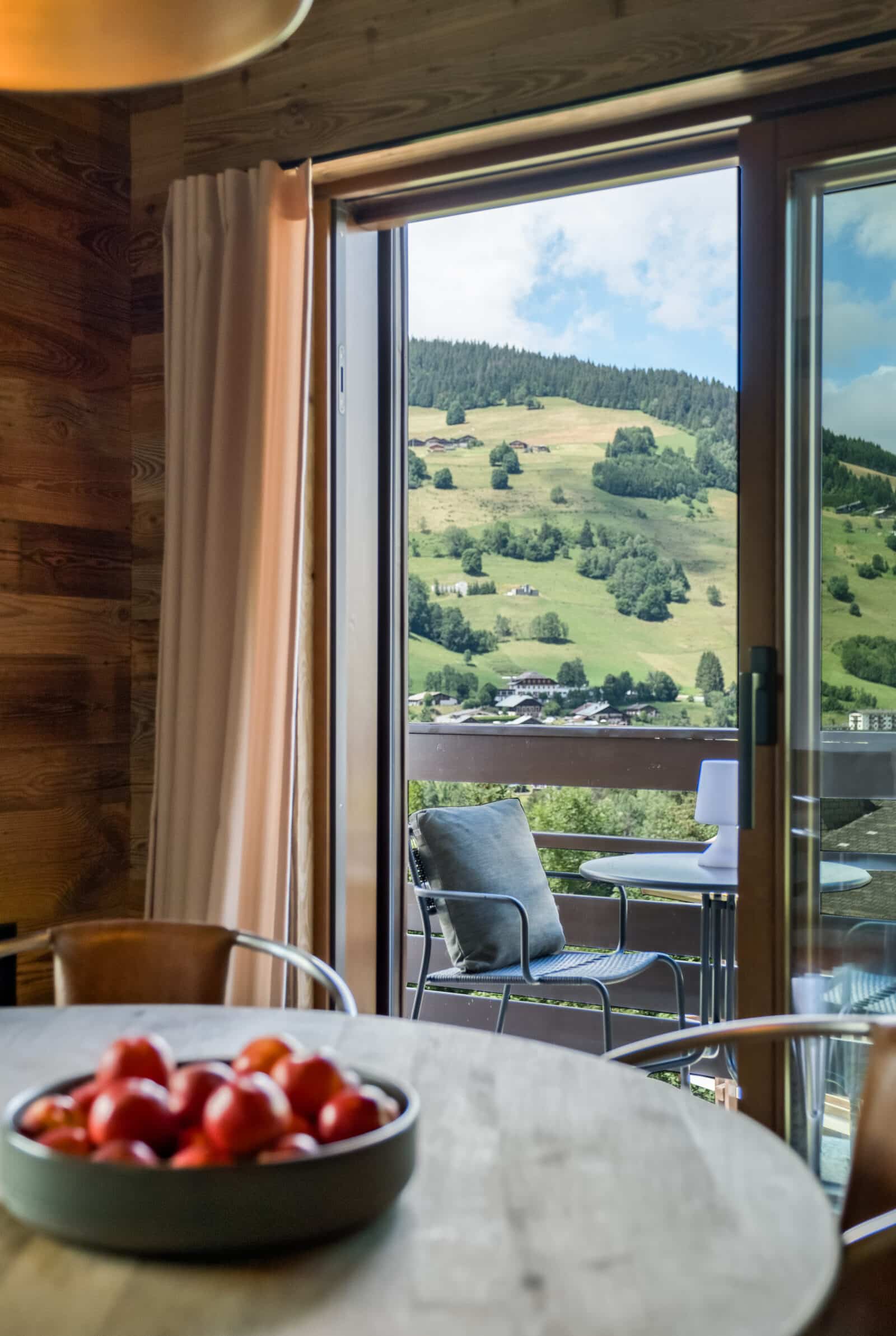 Megeve chalet dining room balcony view nature